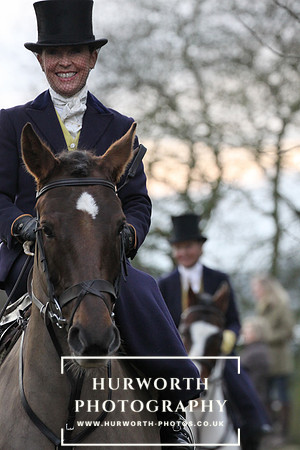 An elegant lady riding sidesaddle